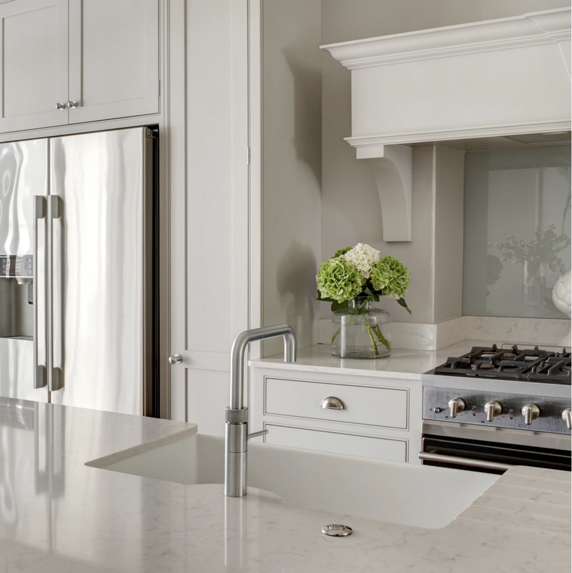 Bespoke pale cabinetry in a traditional kitchen